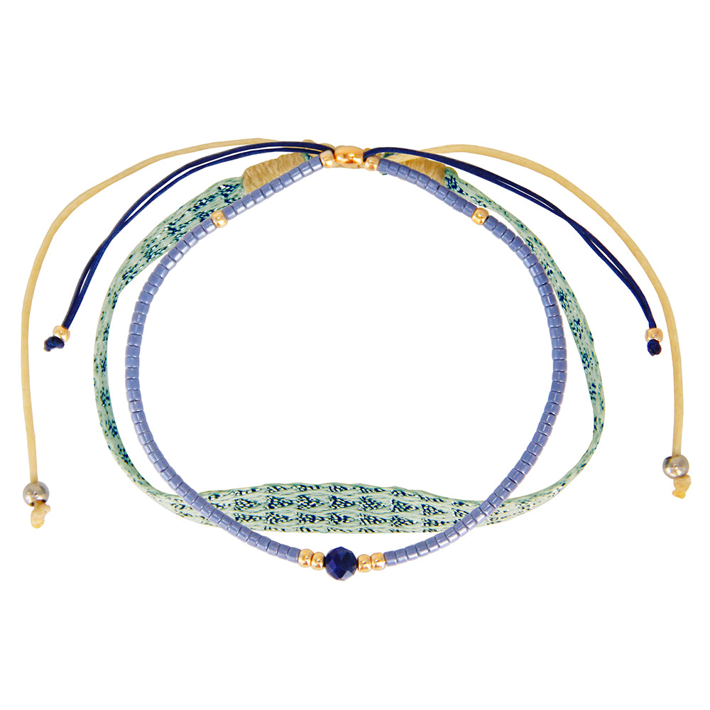 set of 2 bracelets with dark blue nylon band, small blue pearls and a dark blue quartz stone
