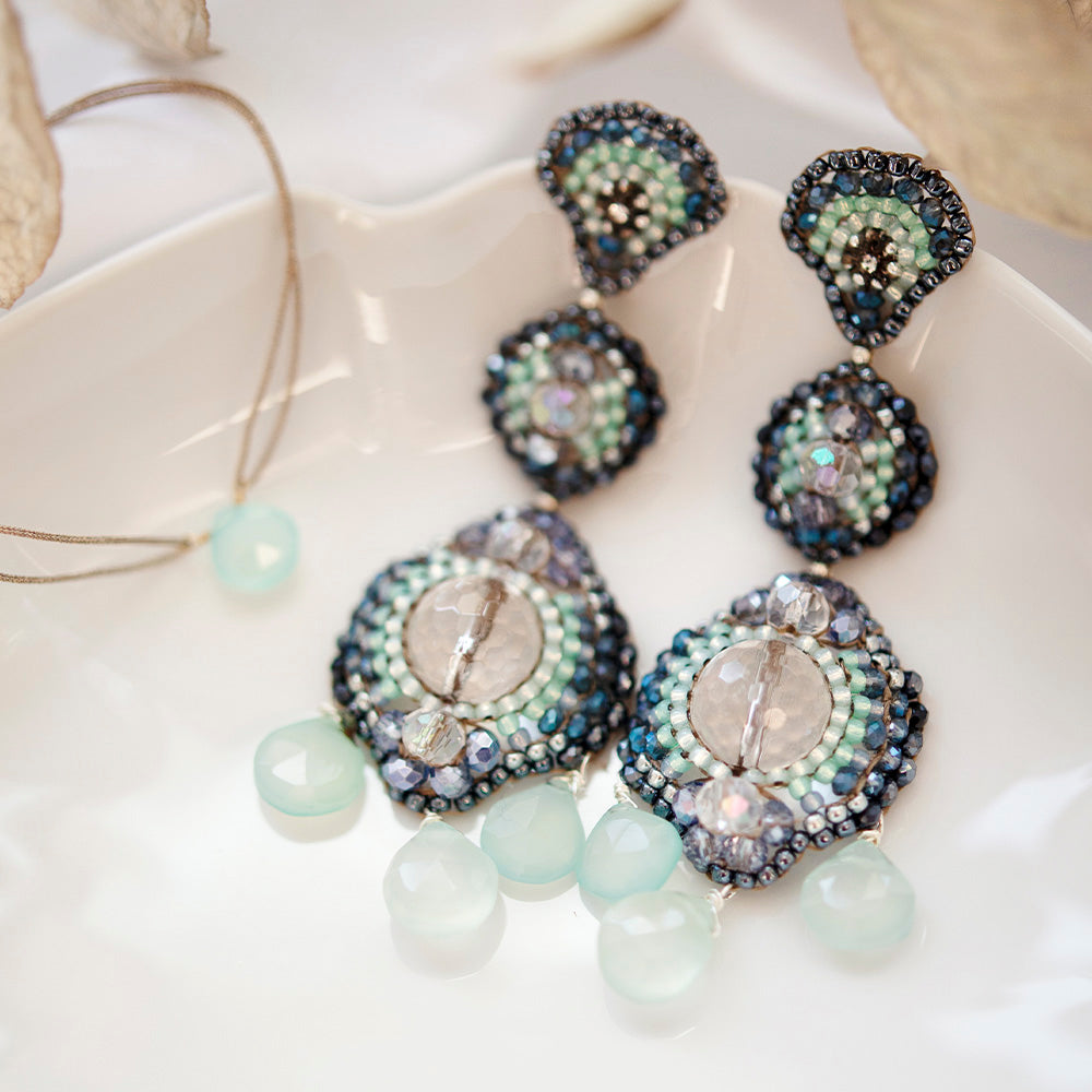 big earrings with white rock crystals, mintgreen amazonite stone and small beads in different blue shades