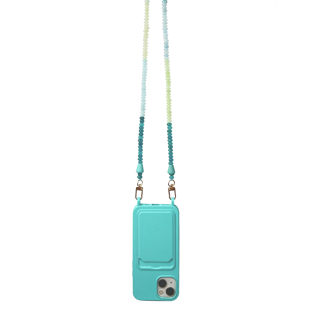 Summer beach accessory: phone chain gemstone necklace with turquoise, light blue, and sage green natural gemstones with a matching phone case that has a card slot and eyelets for the phone chain to connect to.