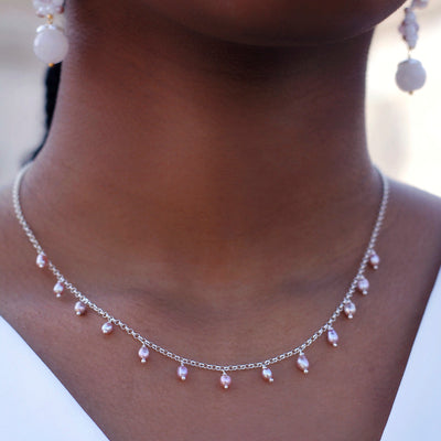silver wedding necklace with small rose colored pearl pendants