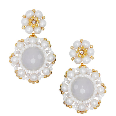 white flower shaped sale pearl earrings with gold details for brides